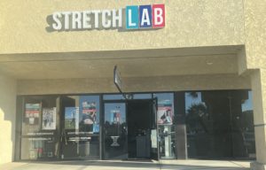 Stretchlab store front for personal trainer stretching 