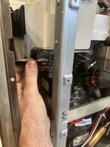 loosen ge opal gear box with wratchet screw driver