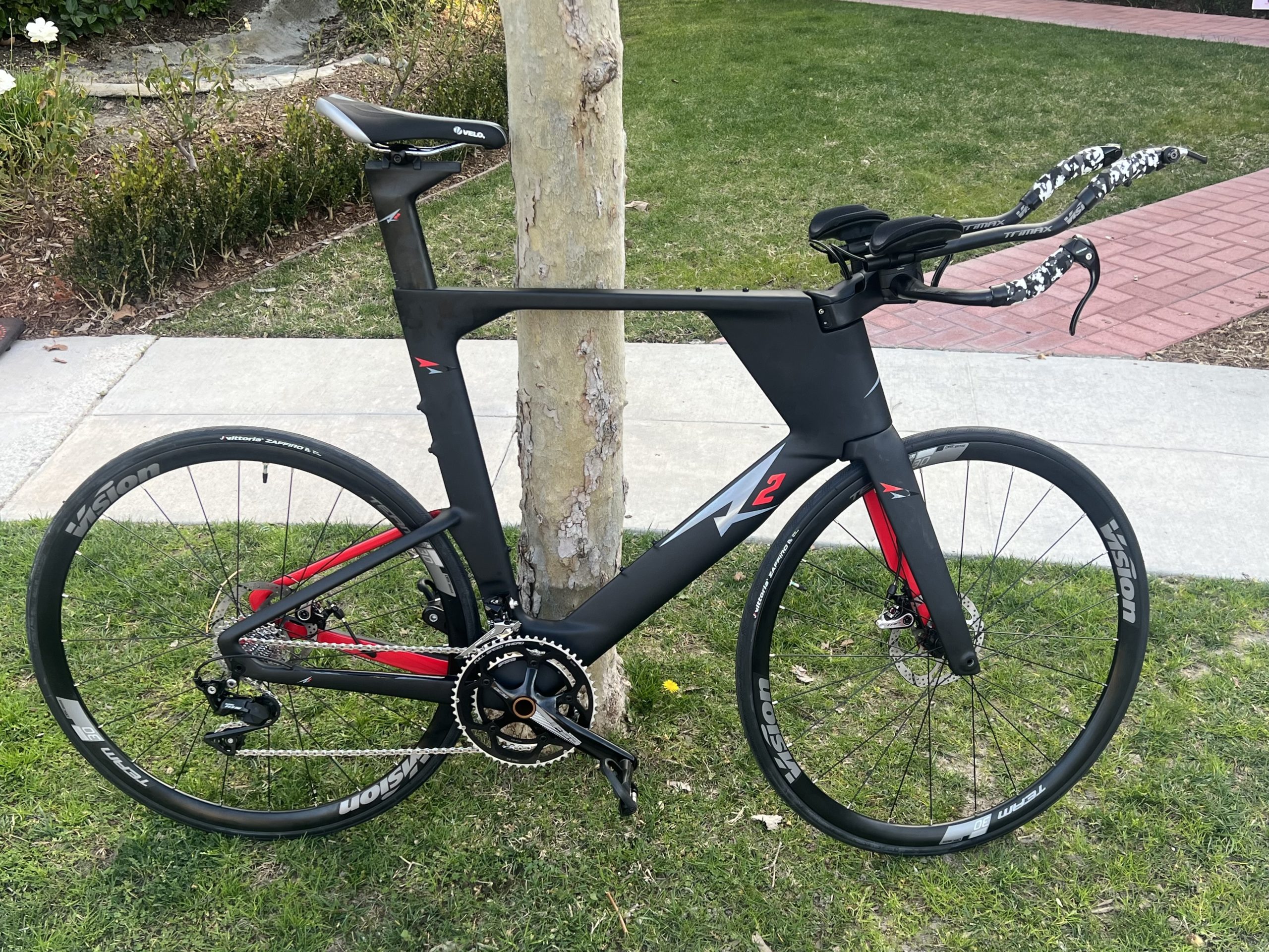 a2 speed phreak triathlon bike leaning on a tree